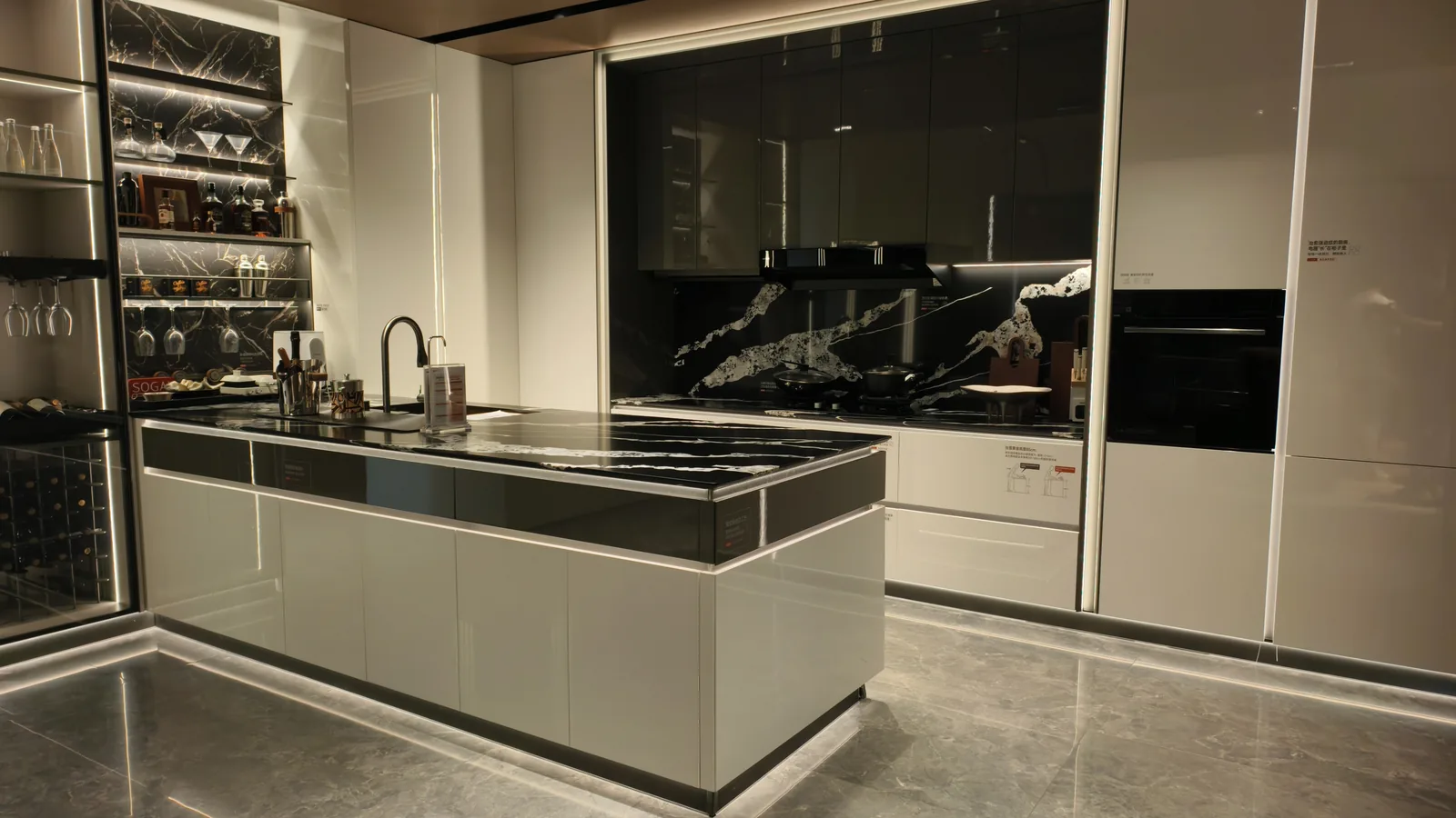 Dark and light two-tone kitchen with full-height louvered door, lit open shelving and a stone worktop