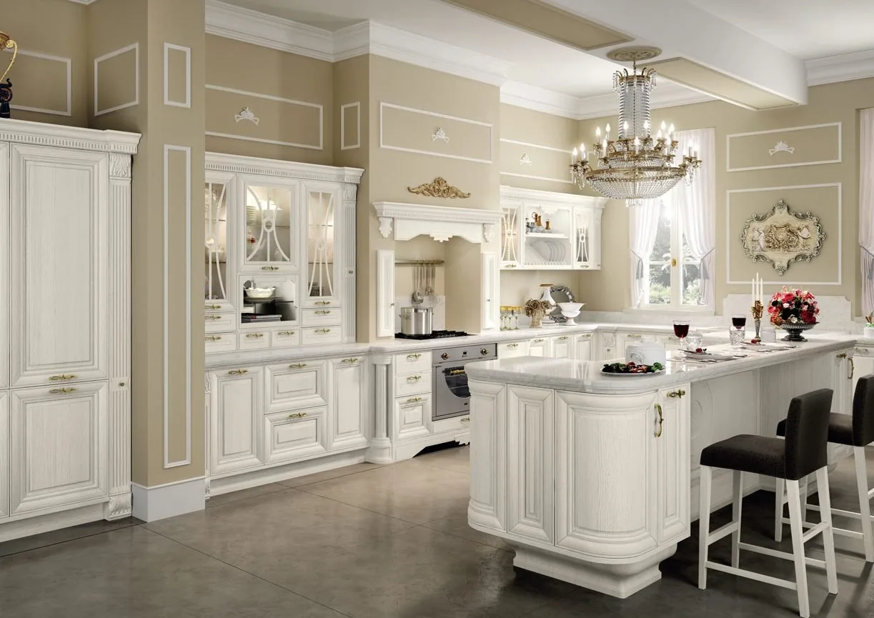 White painted suite kitchen with island and chandelier