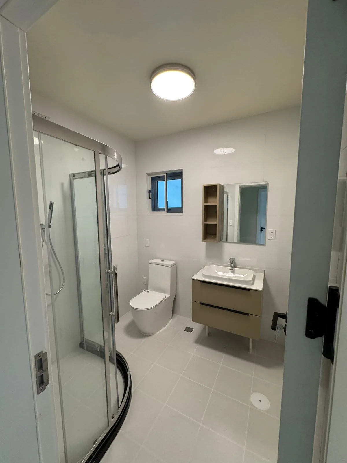 Unit bath with walk-in shower and double vanity
