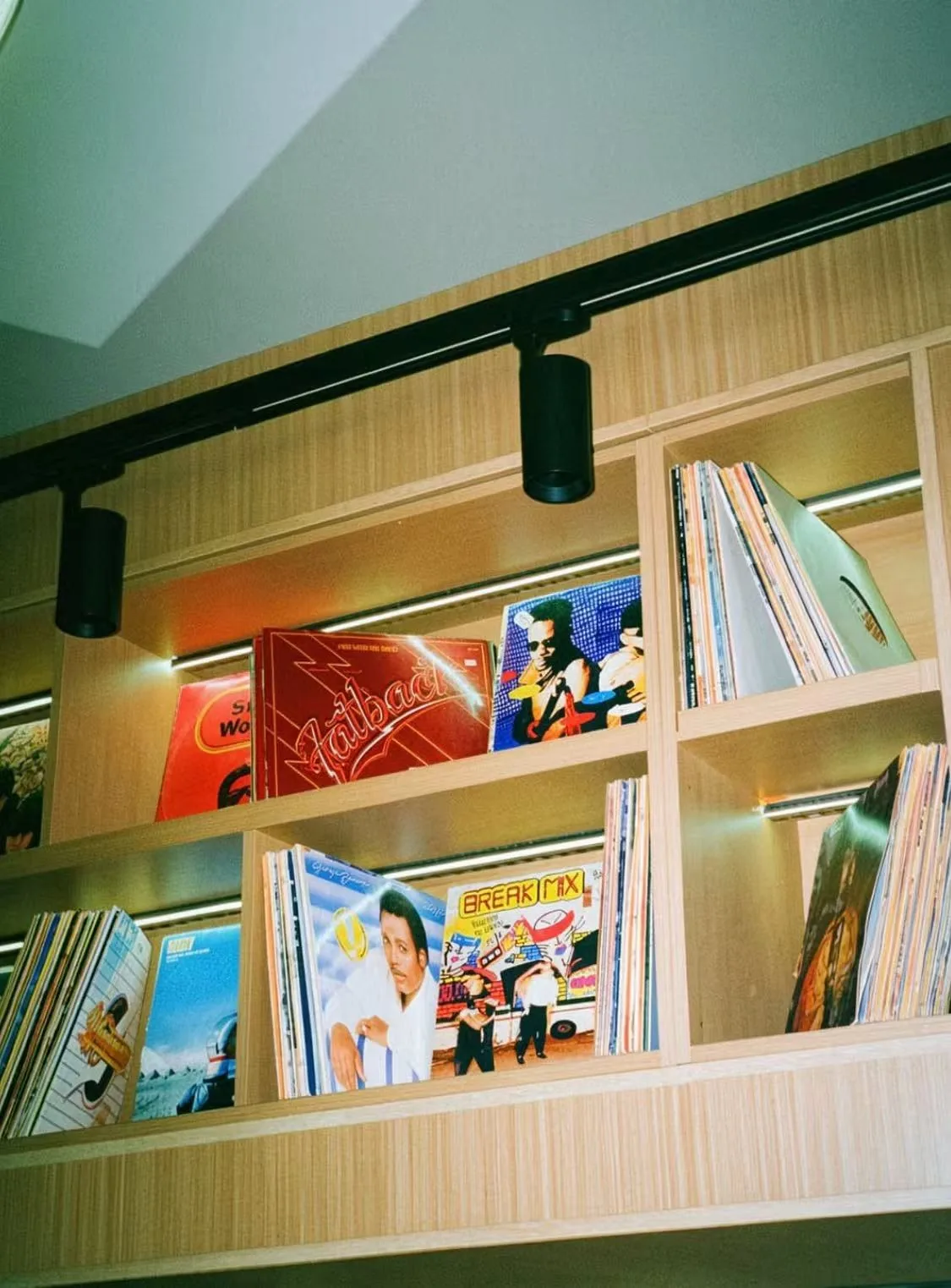 Bedroom with wood head wall, UK