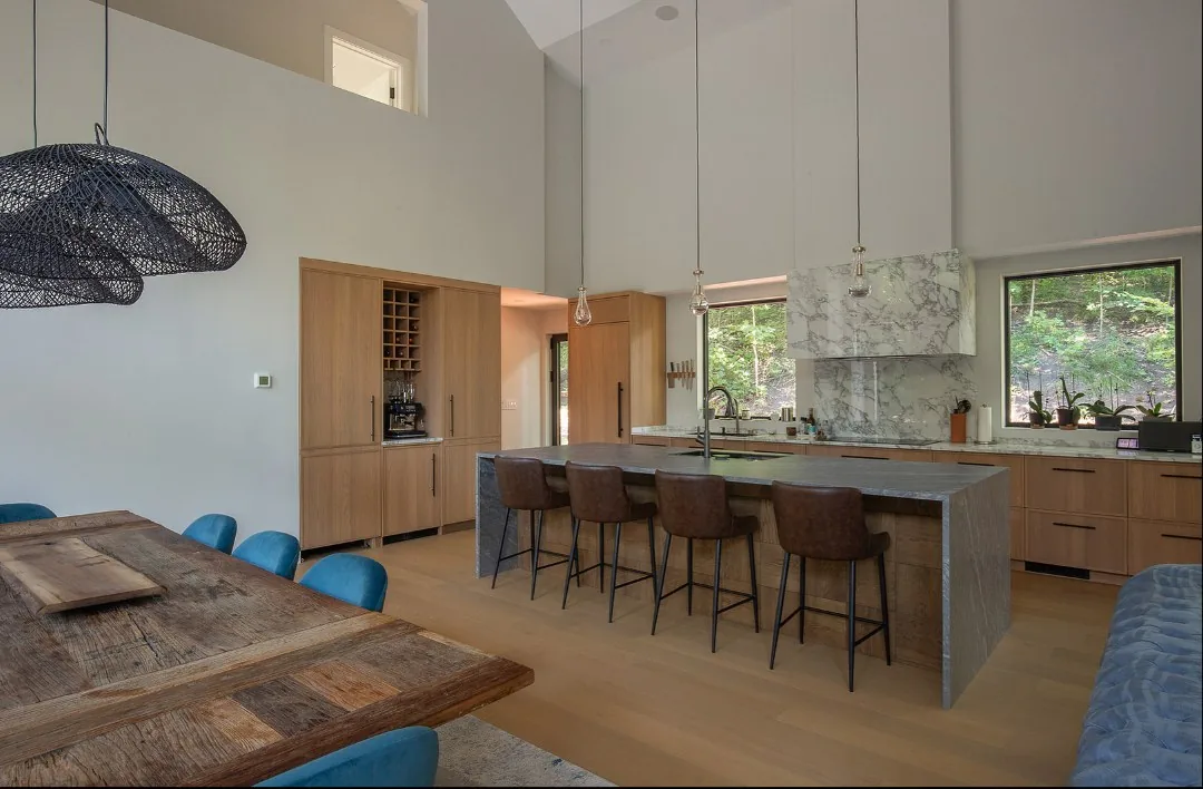 Living room with beams and white cabinetry, UK