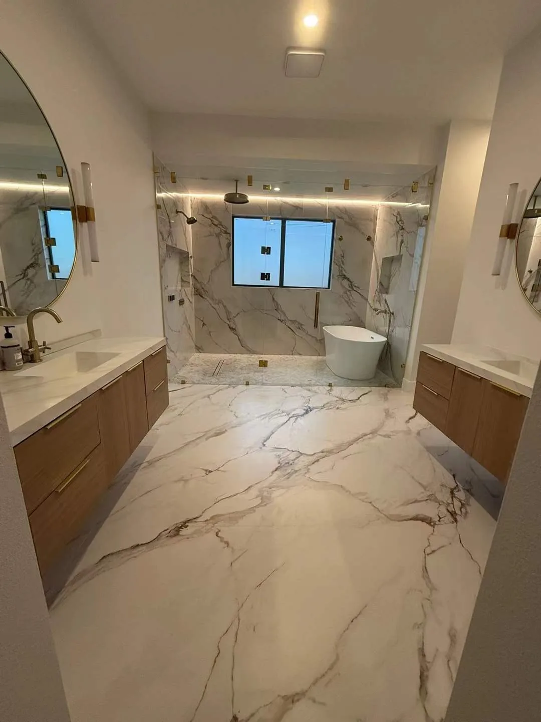 Marble bathroom with double vanity, Texas villa