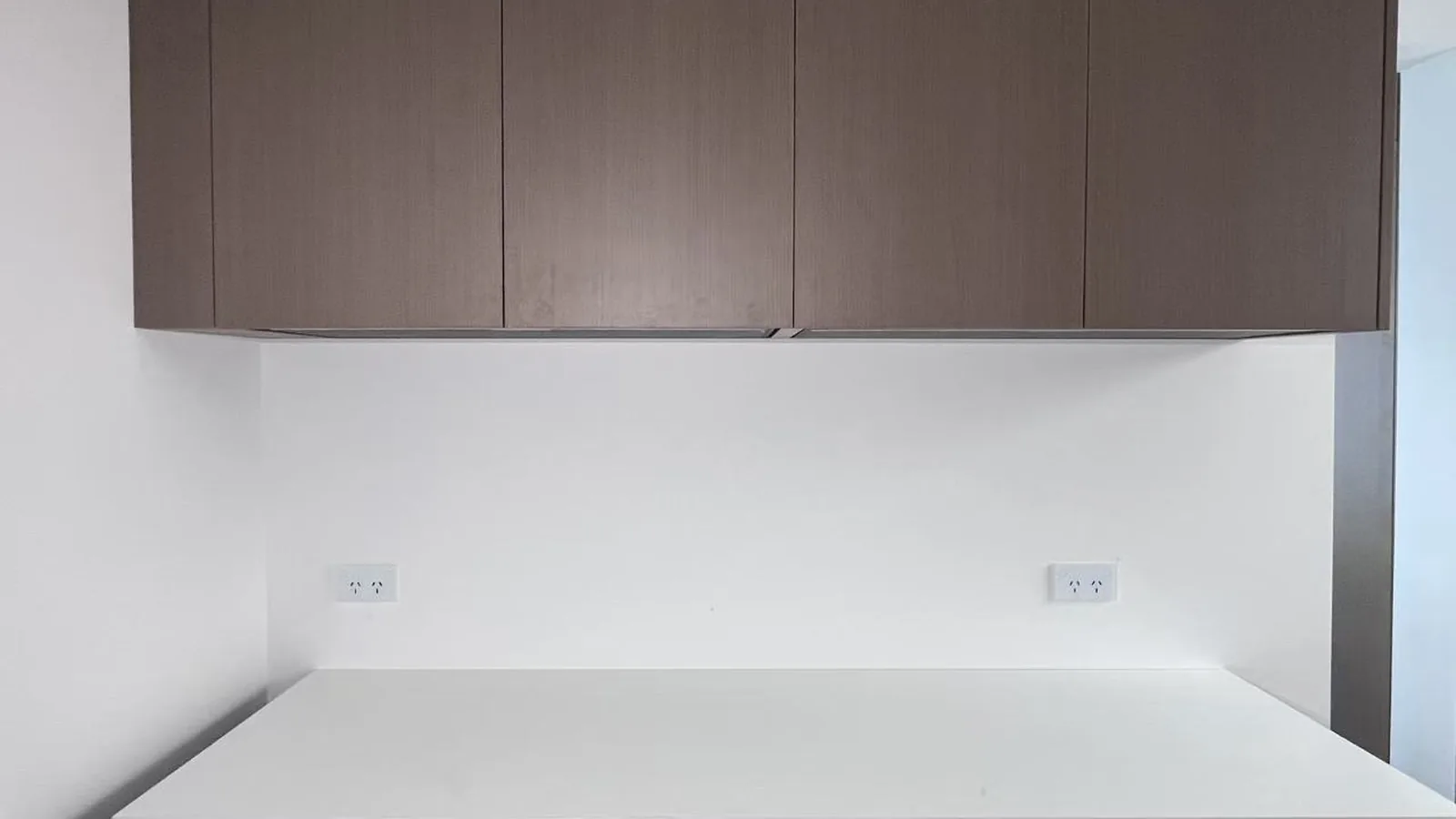 Kitchen counter and wall units with stone top