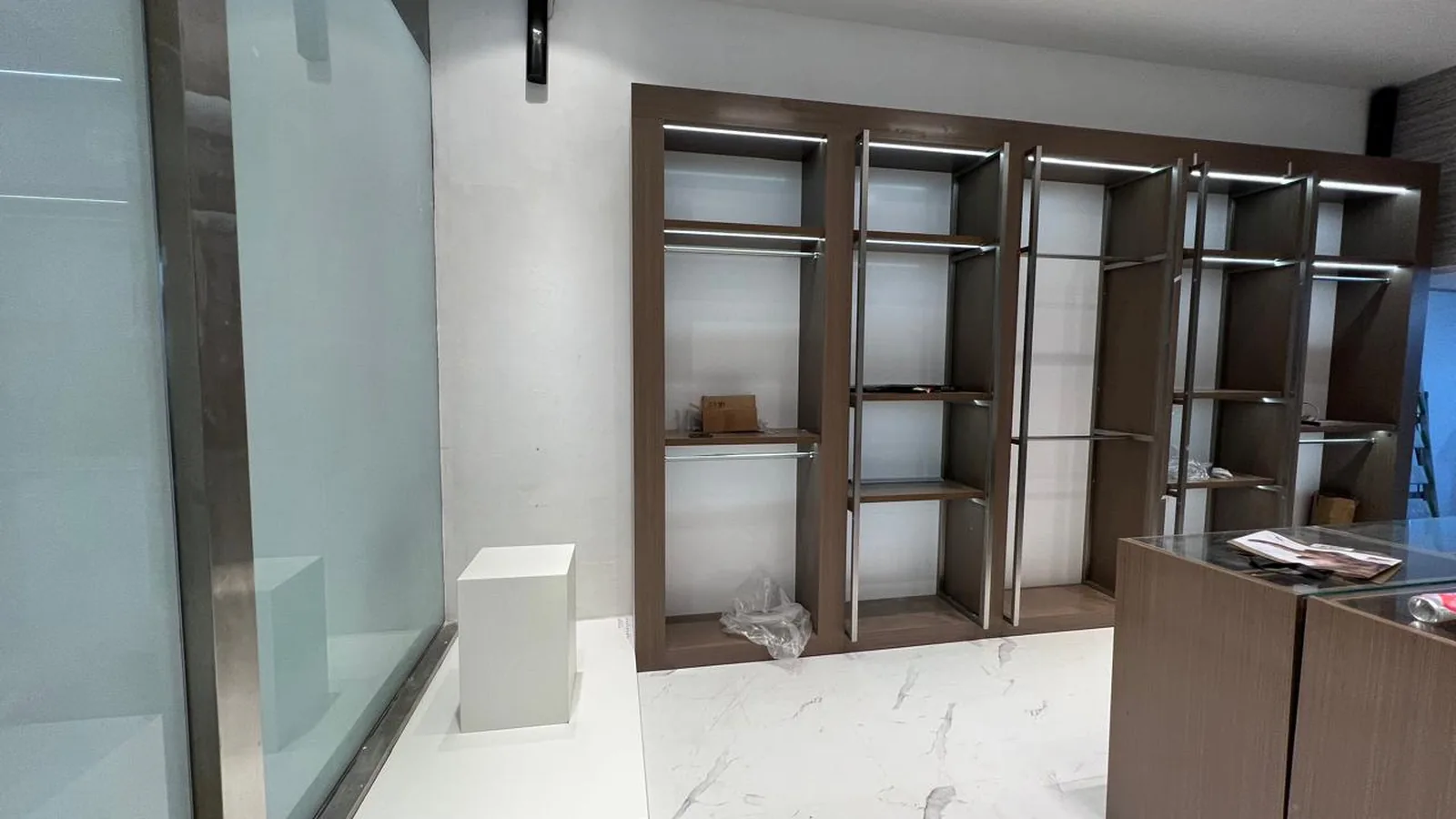 Open shelving and rail units in a fashion store