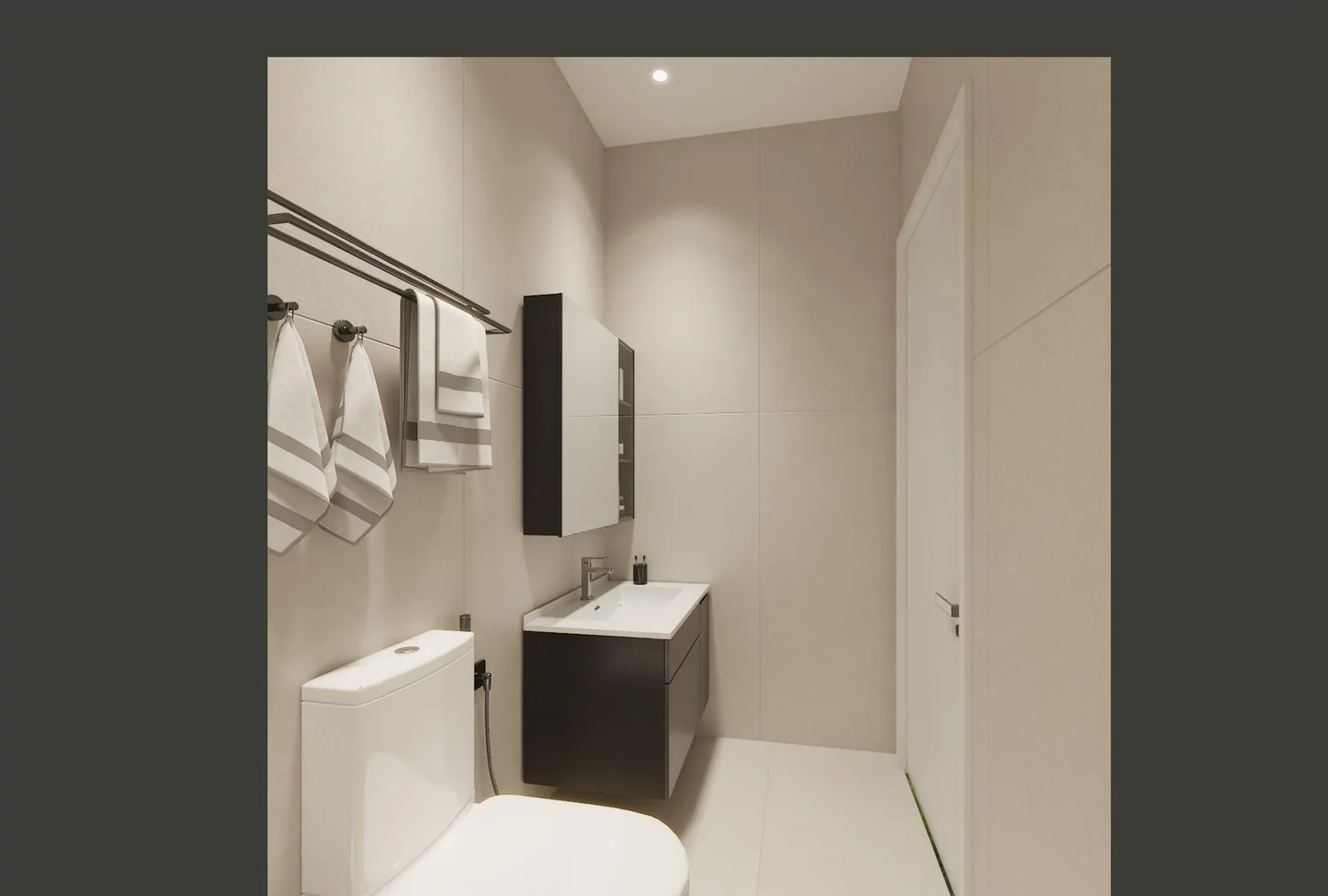 Master bathroom with dark vanity, lit mirror and floating shelf