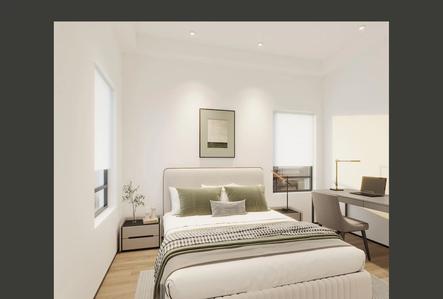 Master bedroom with gray-green bedding, framed art and desk at the foot