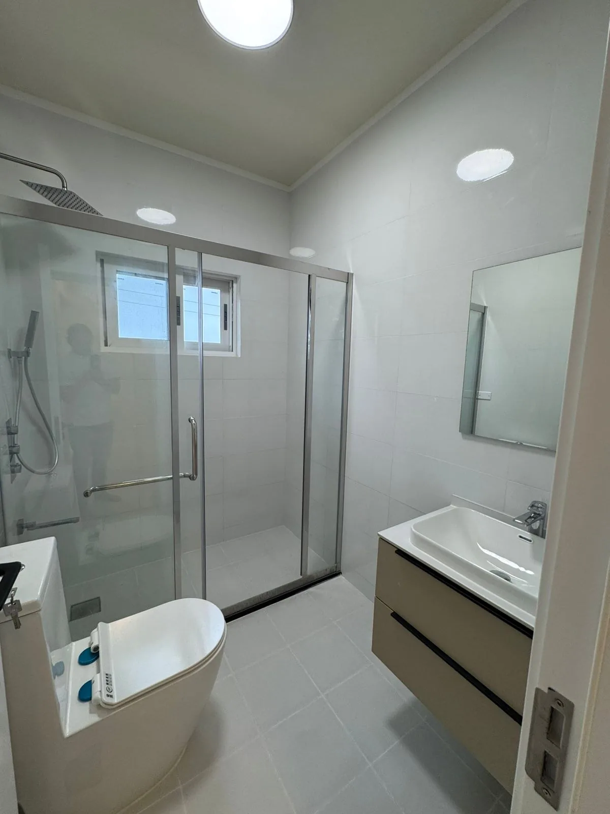 Bath with glass shower, double vanity and freestanding tub
