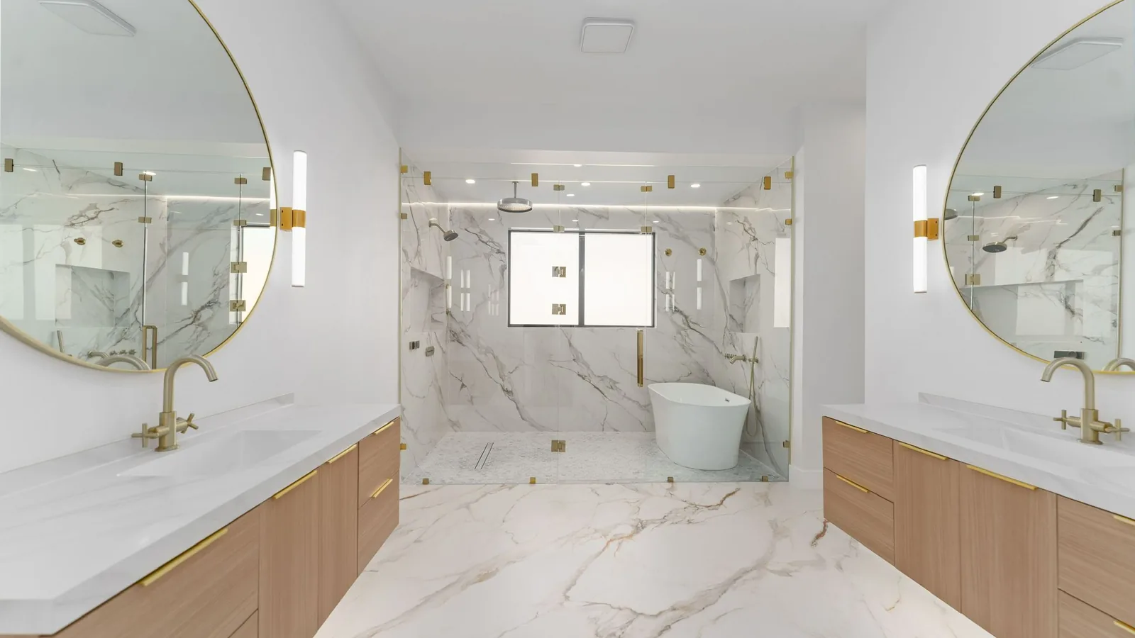 Bathroom vanity with marble-look quartz top and framed mirror