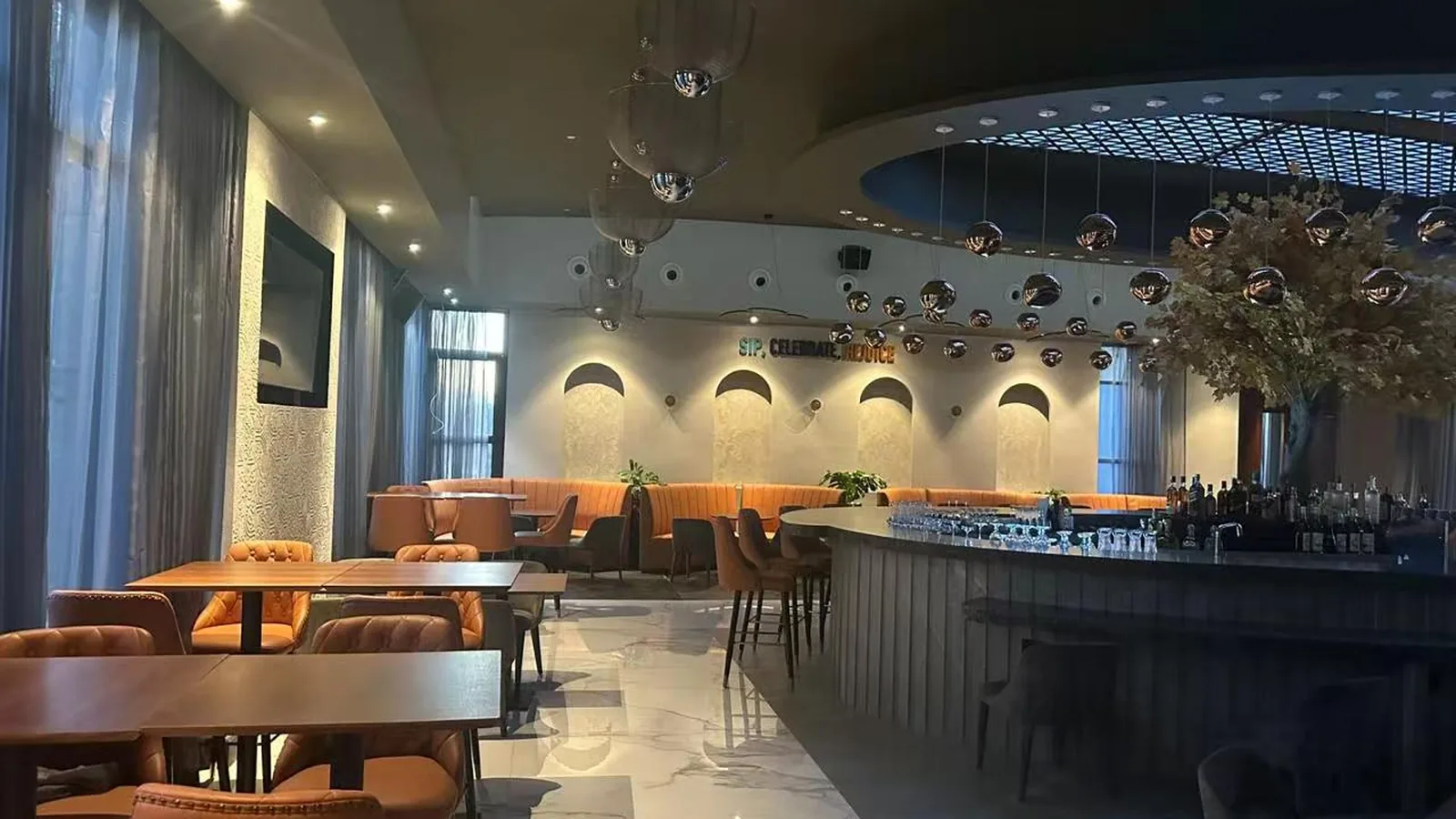 Restaurant dining room with banquette seating and timber joinery