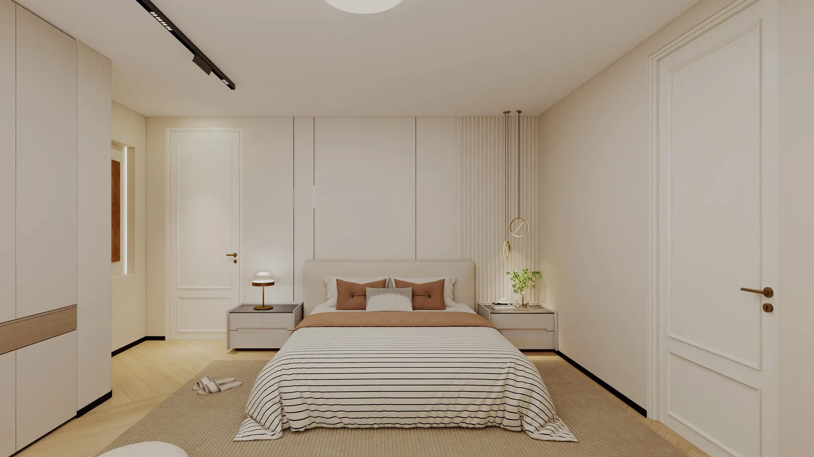 Primary bedroom with a full-width built-in headboard wall and flanking wardrobes