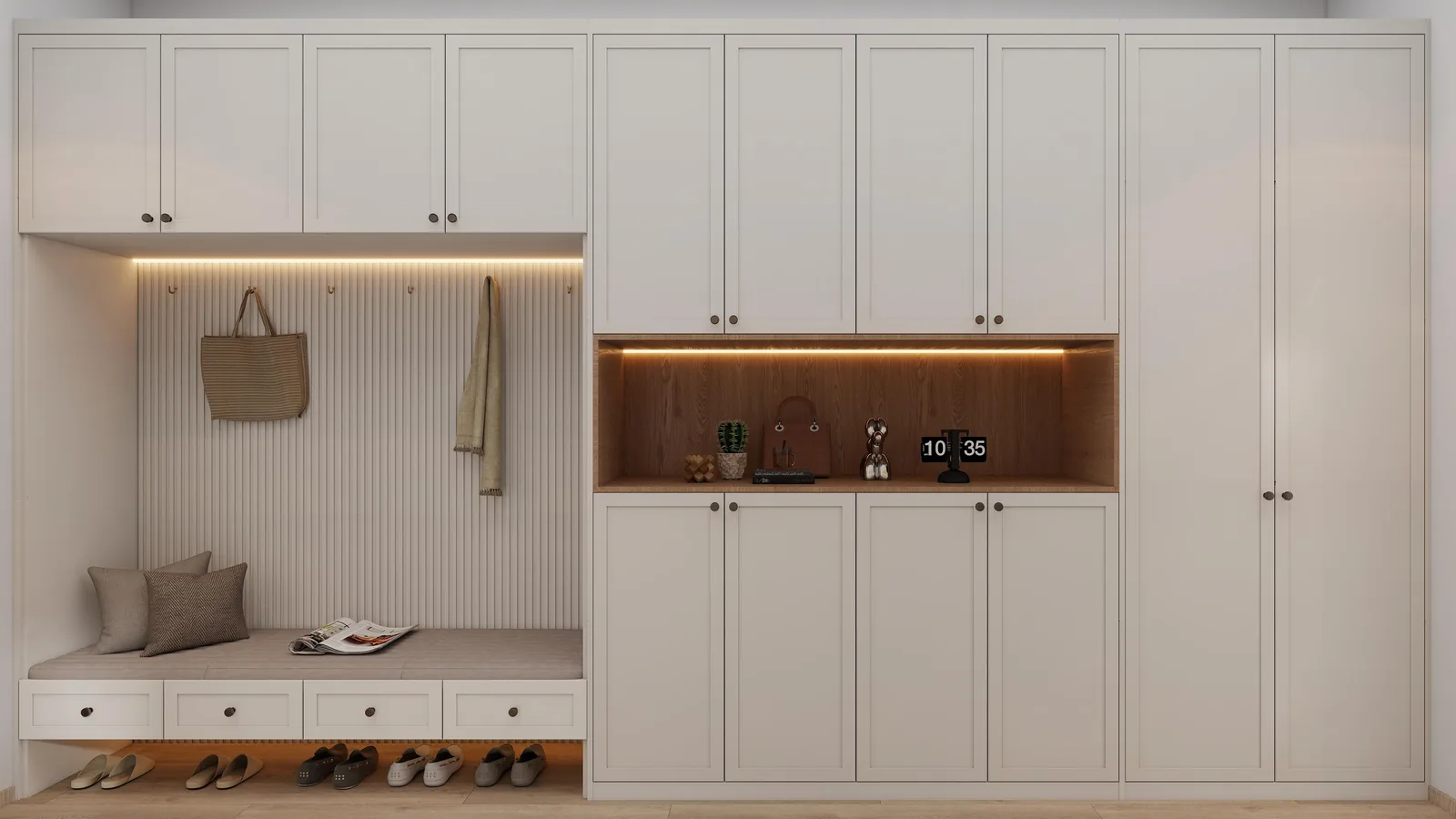 Mudroom with bench, open cubbies and a closed tall cabinet run