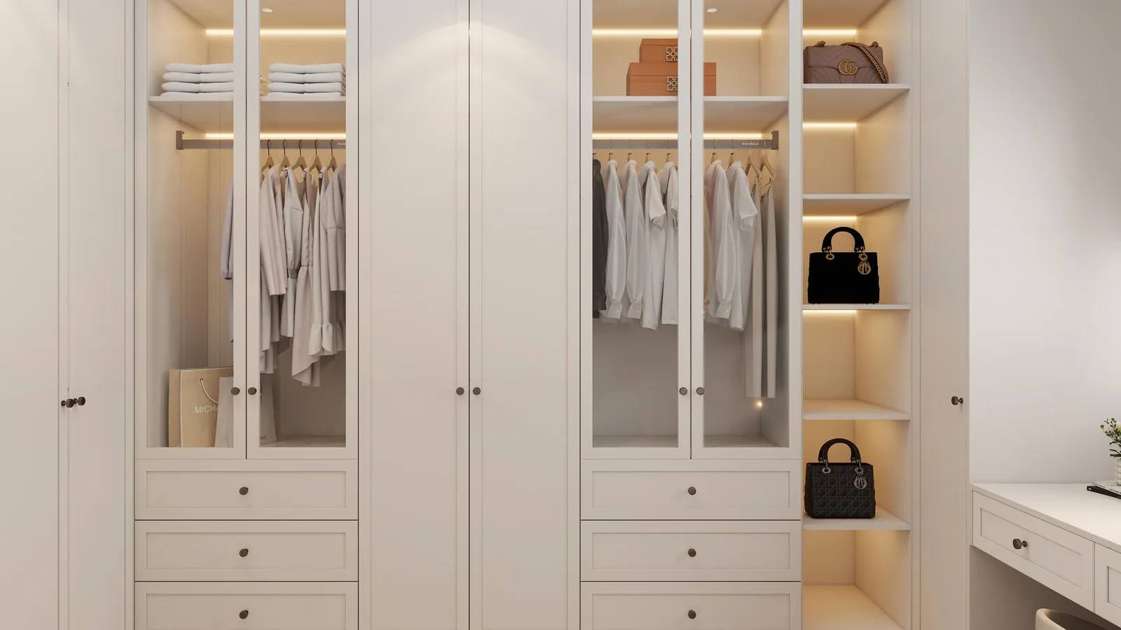Walk-in closet with glass-front towers and integrated lighting