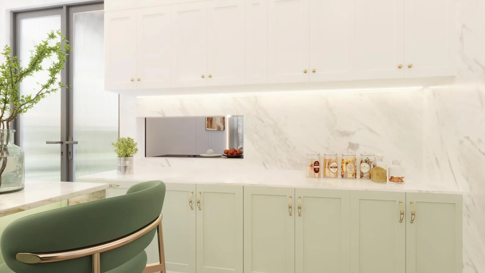 Sink run under a wide window with pale green cabinets and stone counters