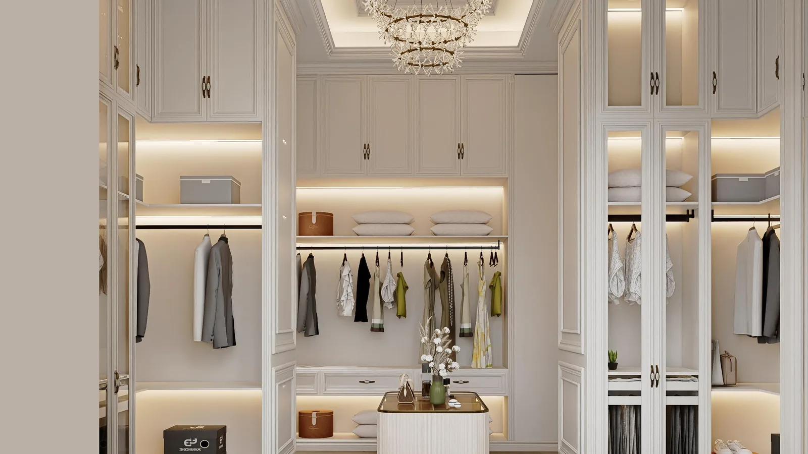 U-shaped walk-in closet in cream with an upholstered ottoman in the centre and chandelier above