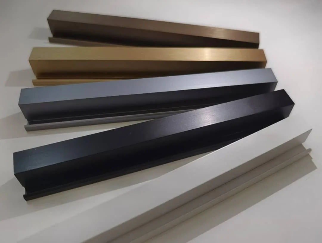 Brushed-metal trim profiles in five finishes, from the hardware wall
