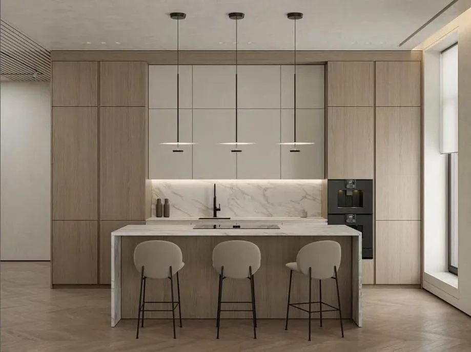 Dark kitchen with steel elements and island