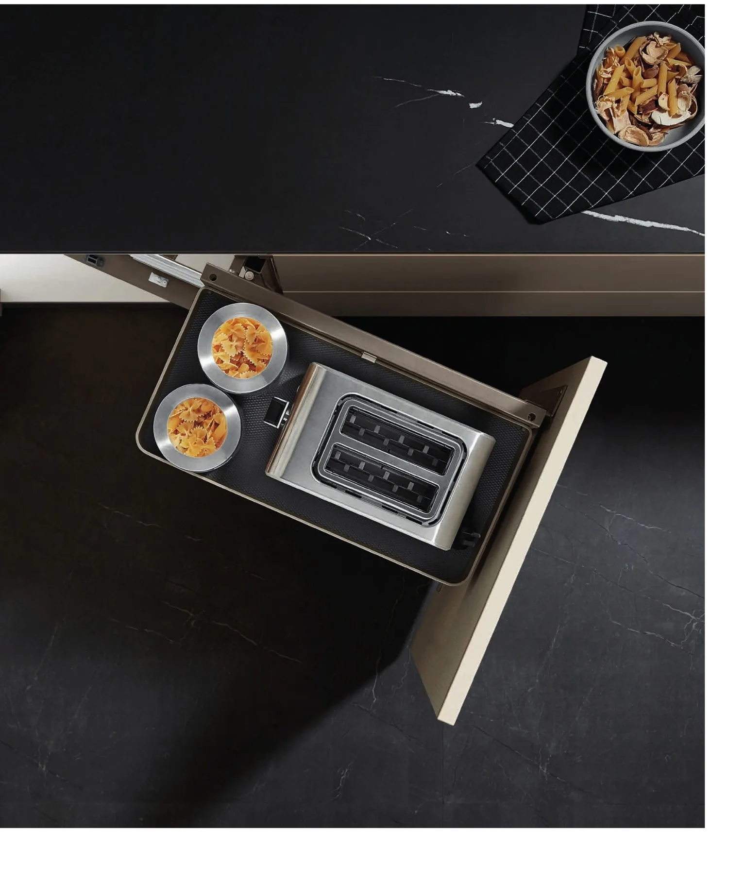 Corner pull-out basket in a dark slab cabinet