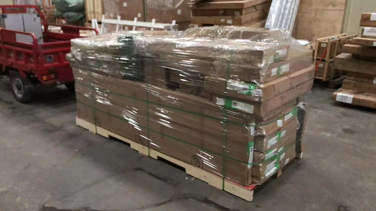 Pallets of flat-pack cabinet crates ready for export