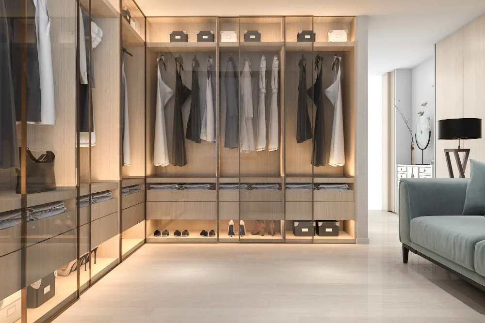 Hinged wardrobe bays with frosted glass doors and integrated lighting