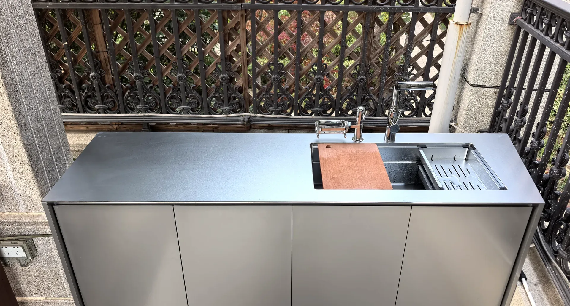 Stainless steel base unit with an integrated sink, drainer and cutting board, installed for a customer.