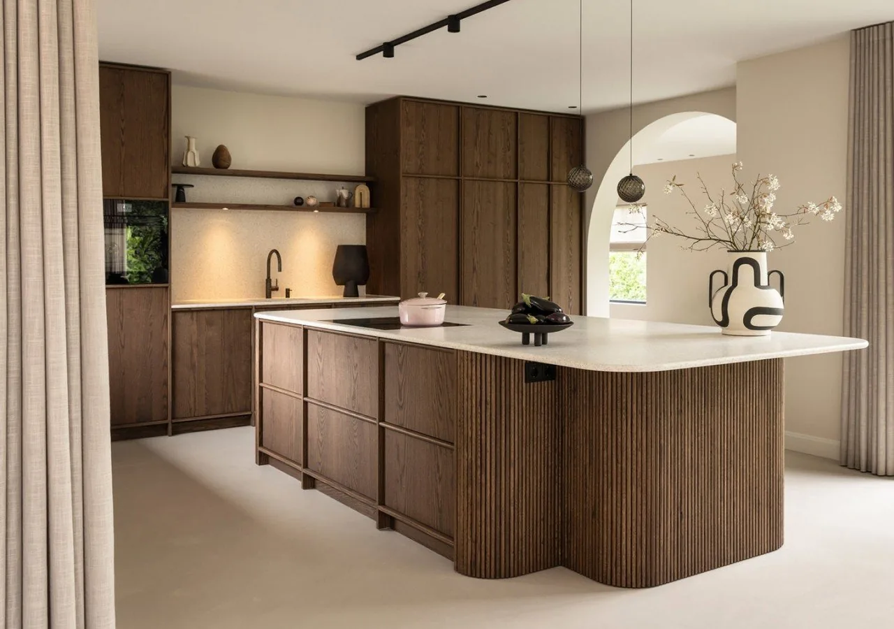 Fluted oak island in a bright luxury kitchen